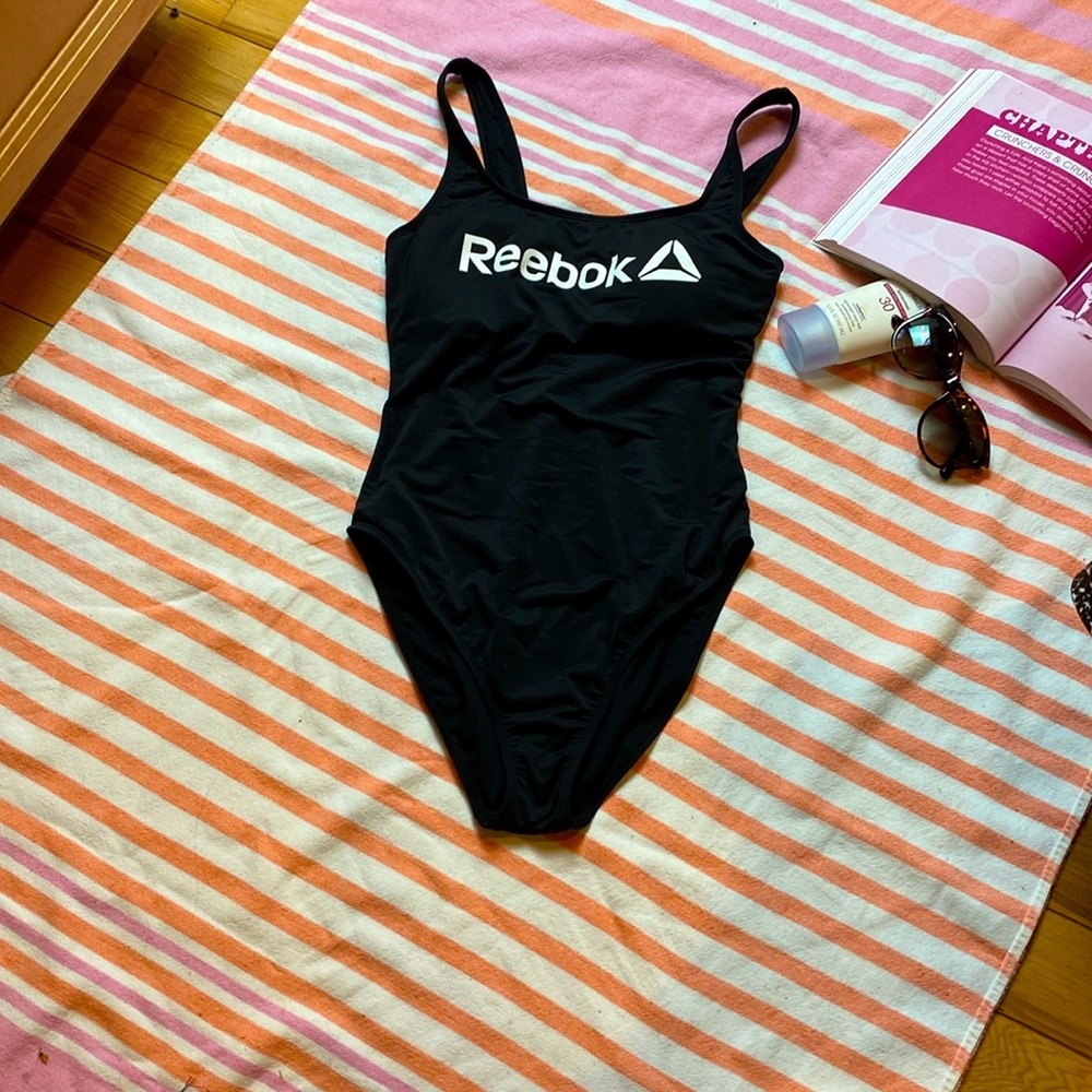 Reebok black with white one piece swimsuit, size medium
S-1